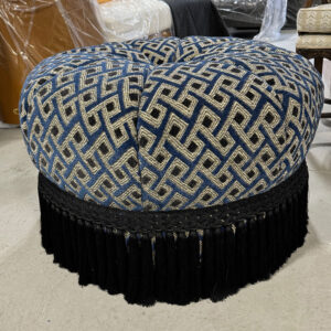 Round tufted ottoman